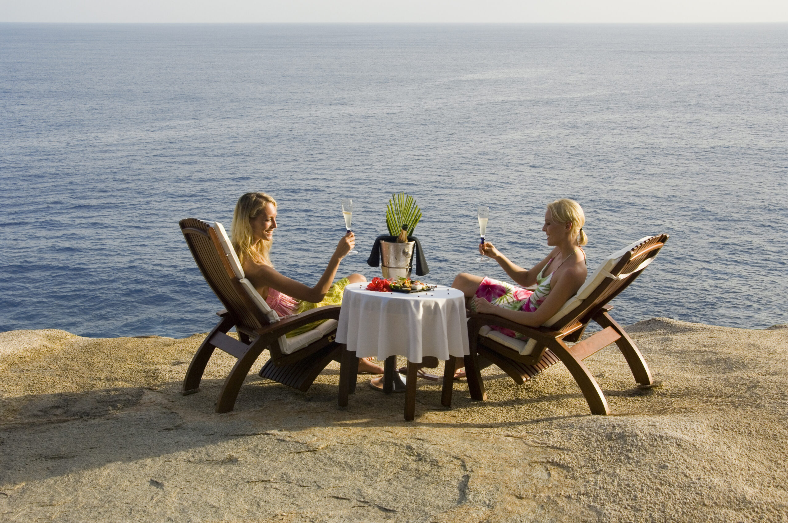 friends-toasting-drinks-at-beach-2026-03-26-08-49-57-utc